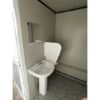 Intérieur unité sanitaire modulaire avec douche et toilettes Intérieur unité sanitaire modulaire avec douche et toilettes